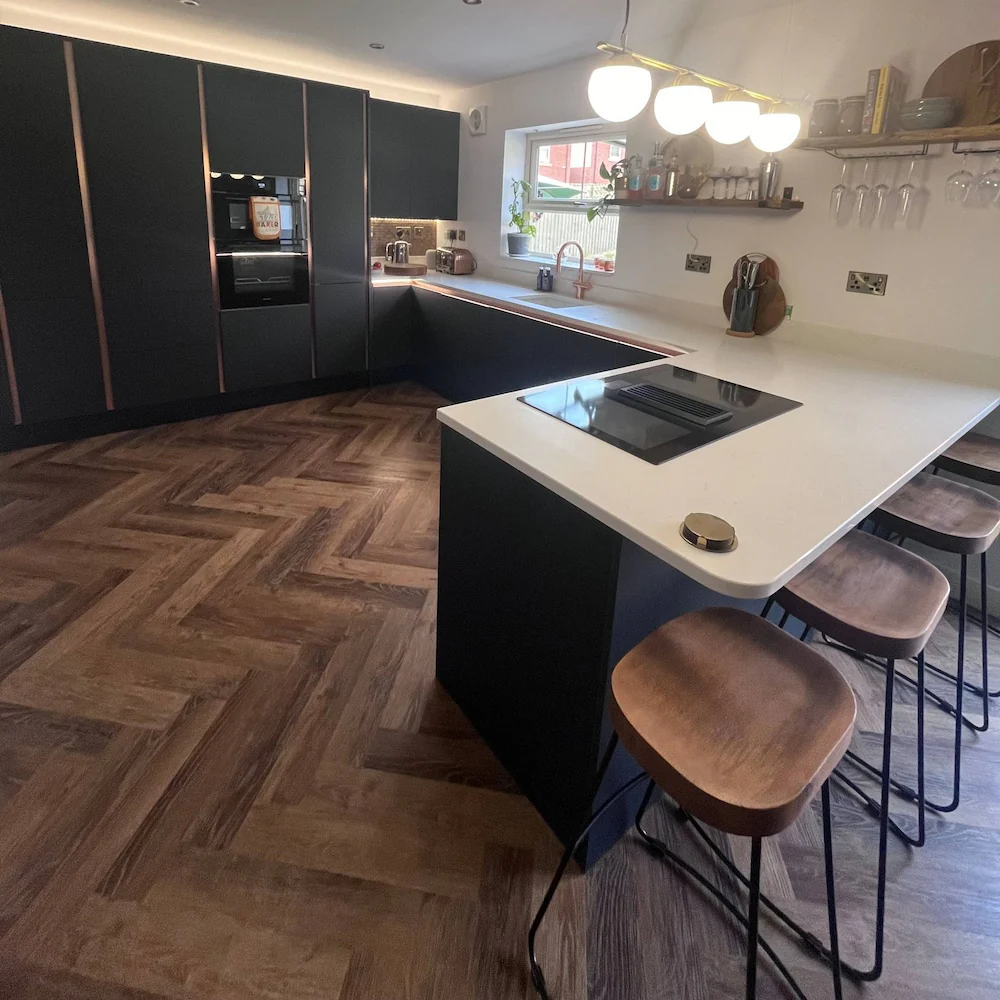Elegant living room with herringbone wood flooring